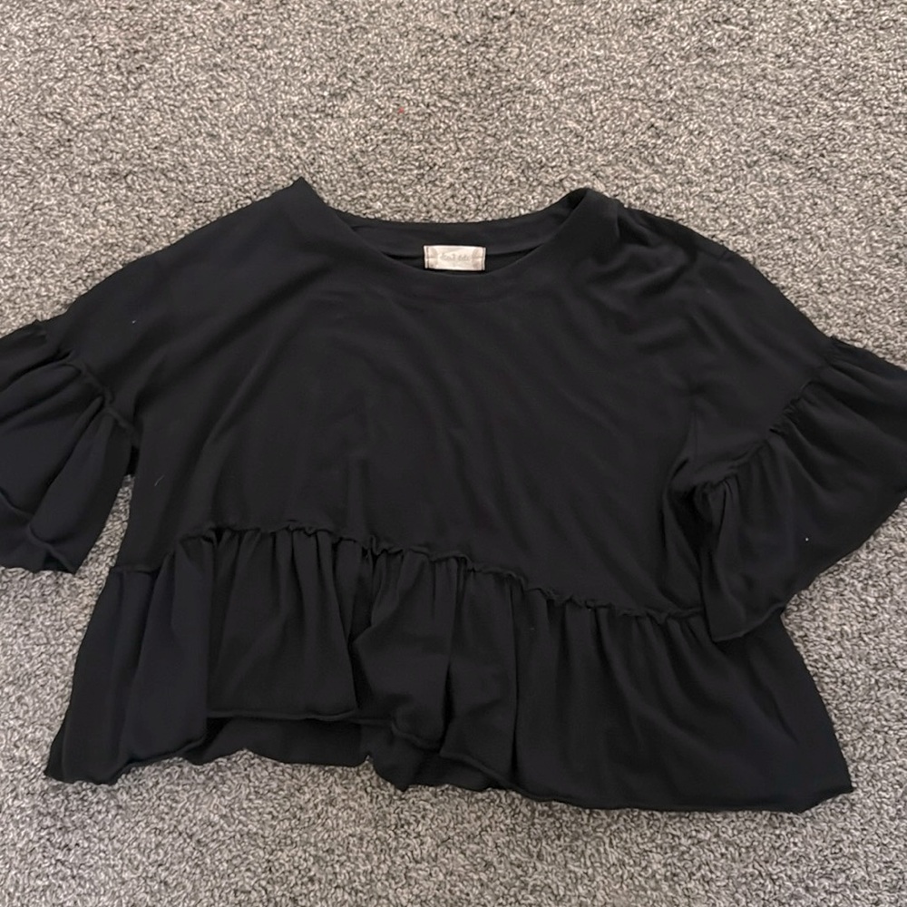 Super cute cropped all black ruffle shirt!